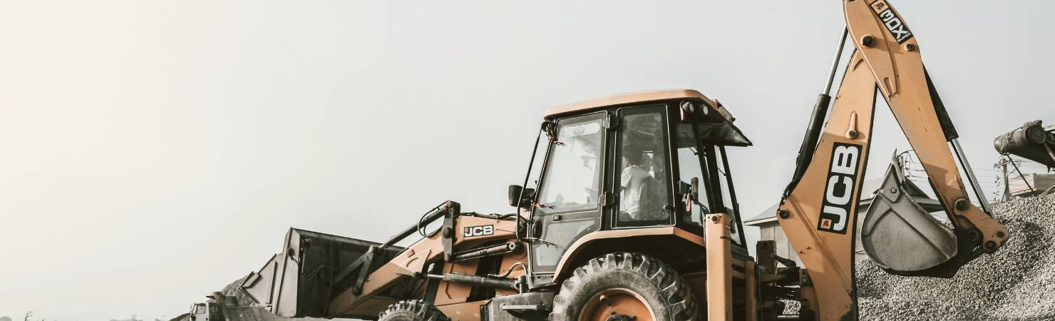 JCB yellow digger on a work site